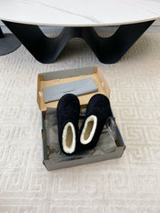 FLAT ANKLE BOOTS IN BLACK SUEDE AND SHEARLING LINING