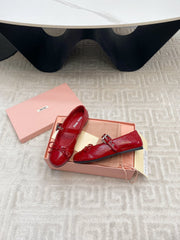BOW MARY JANE FLAT IN RED NAPLAK LAMBSKIN