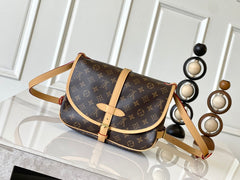 SAUMUR BB 35 IN BROWN MONOGRAM CANVAS AND LEATHER TRIM GOLD HARDWARE
