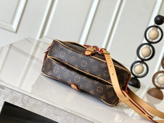 SAUMUR BB 35 IN BROWN MONOGRAM CANVAS AND LEATHER TRIM GOLD HARDWARE