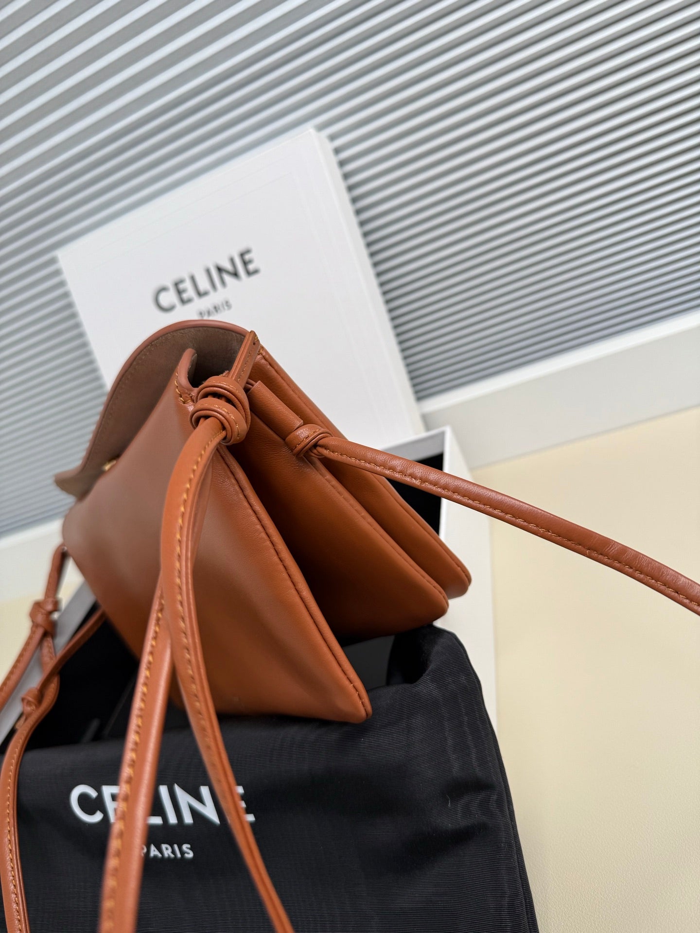 CELINE 25S TRIO FLAP 22MM IN BURNT ORANGE SMOOTH LAMBSKIN GOLD HARDWARE