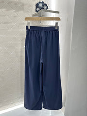 MIUMIU HIGH-WAISTED WIDE-LEG PANTS WITH BOW 276652