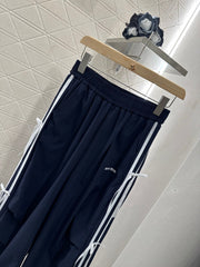 MIUMIU HIGH-WAISTED WIDE-LEG PANTS WITH BOW 276652