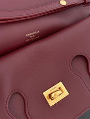 BEL AIR CLUTCH 27 IN BURGUNDY RED NAPPA LAMBSKIN GOLD HARDWARE