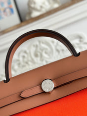 ZIP CABINE 31 BAG IN FIRE ORANGE CANVAS AND BRONZE BROWN CALFSKIN