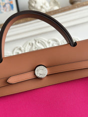 ZIP CABINE 31 BAG IN FUCHSIA PINK CANVAS AND BRONZE BROWN CALFSKIN