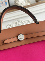 ZIP CABINE 31 BAG IN FUCHSIA PINK CANVAS AND BRONZE BROWN CALFSKIN