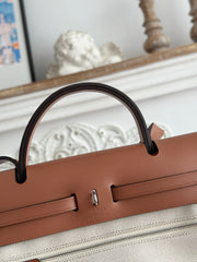 HERBAG ZIP 31 RETOURNE PEGASE POP BAG IN OFF-WHITE MIX RED CANVAS AND HUNTER COWHIDE