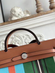 HERBAG ZIP 31 LAQUERED BAG IN GREEN MIX BLUE H PLUME CANVAS