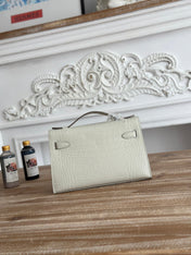 HM 26S KELLY MINI 22MM IN MILKY WHITE CROC EMBOSSED CALFSKIN SILVER KELLY BUCKLE