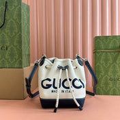 SMALL DRAWSTRING SHOULDER BAG 21 IN WHITE CANVAS DARK BLUE CALFSKIN