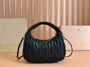 WANDER MATELASSÉ HANDBAG 23 IN BLACK LAMBSKIN