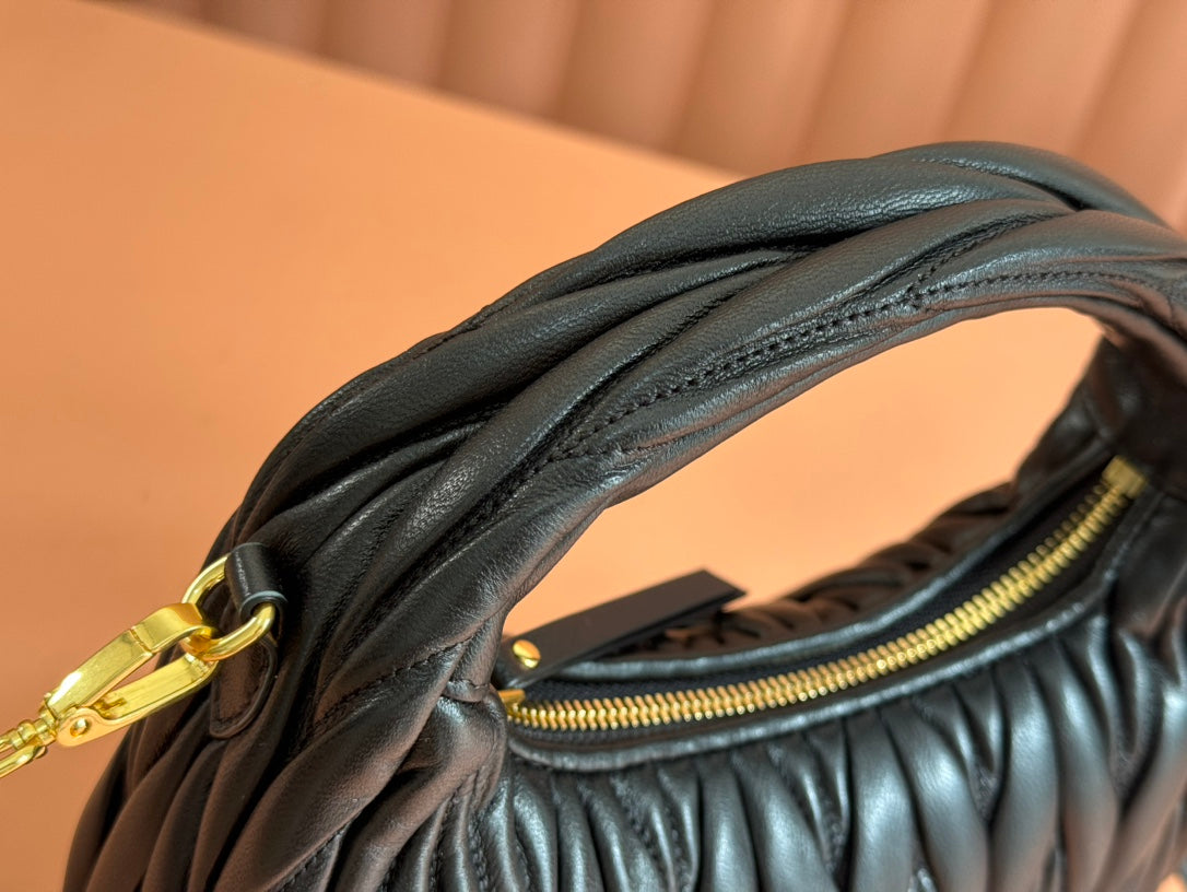 WANDER MATELASSÉ HANDBAG 23 IN BLACK LAMBSKIN