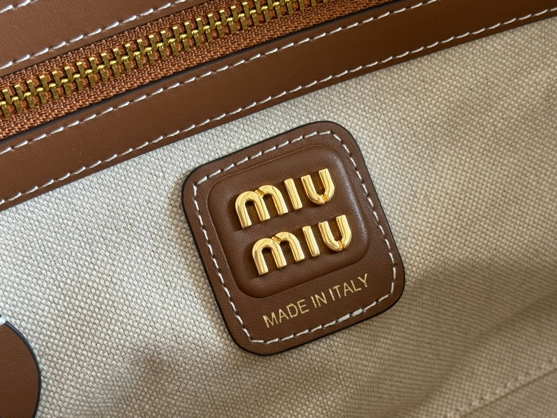 BOWLING BAG 28 IN WHITE CANVAS AND BROWN CALFSKIN TRIM