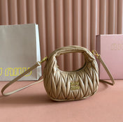 WANDER MATELASSÉ NAPPA MINI BAG 18 IN CARAMEL LAMBSKIN