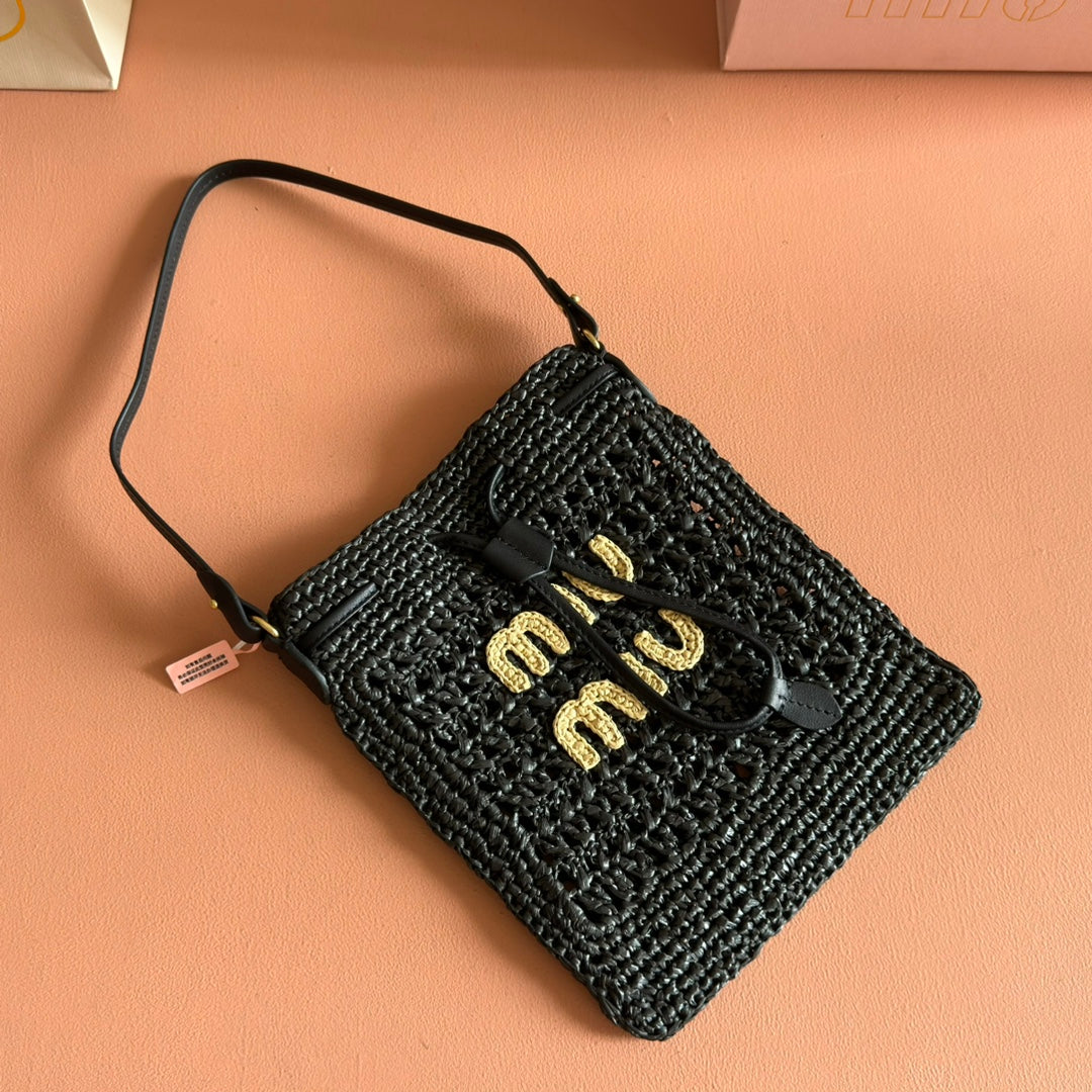 WANDER BUCKET BAG 23 BLACK IN RAFFIA WITH LEATHER TRIM