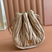MIUMIU 26S MATELASSE POUCH BAG 16 IN LIGHT BEIGE CALFSKIN GOLD HARDWARE