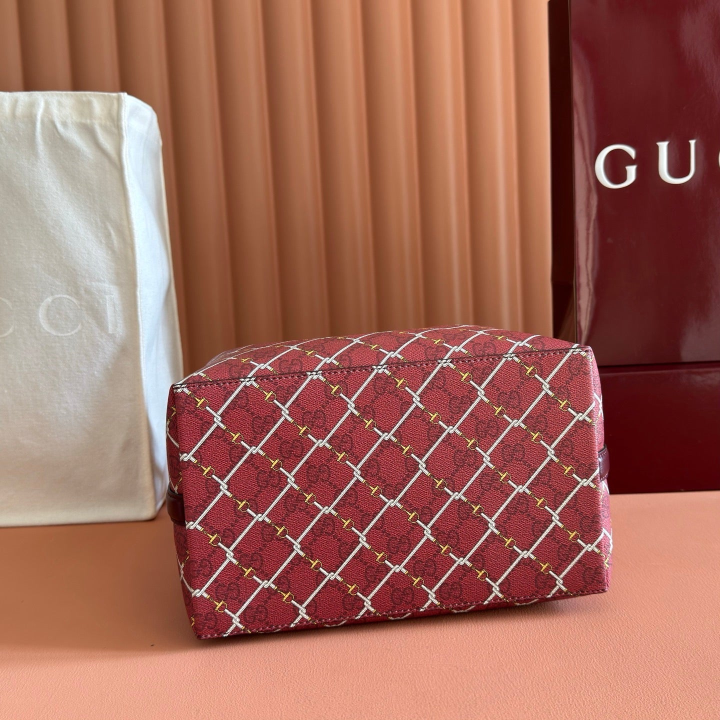 GUCCI 26S GG EMBLEM BUCKET BAG 25 IN DARK RED COATED FABRIC