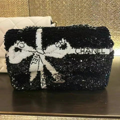CHANEL 25S FLAP BAG 20 CM IN BLACK SEQUINS WITH WHITE BOW