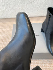 ANKLE BOOTS IN BLACK LOGO EMBOSSED SOFT SHEEPSKIN