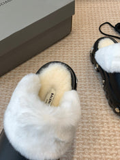 PLATFORM MULES IN BLACK RUBBER MIX RABBIT FUR SILVER HARDWARE