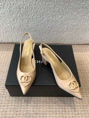 MID-HEEL SLINGBACKS IN BISQUE BEIGE PATENT CALFSKIN