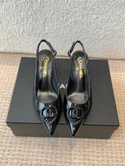 MID-HEEL SLINGBACKS IN BLACK PATENT CALFSKIN