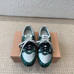 GYMNASIUM SNEAKER IN SILVER FABRIC AND DARK GREEN SNAKE EFFECT CALFSKIN