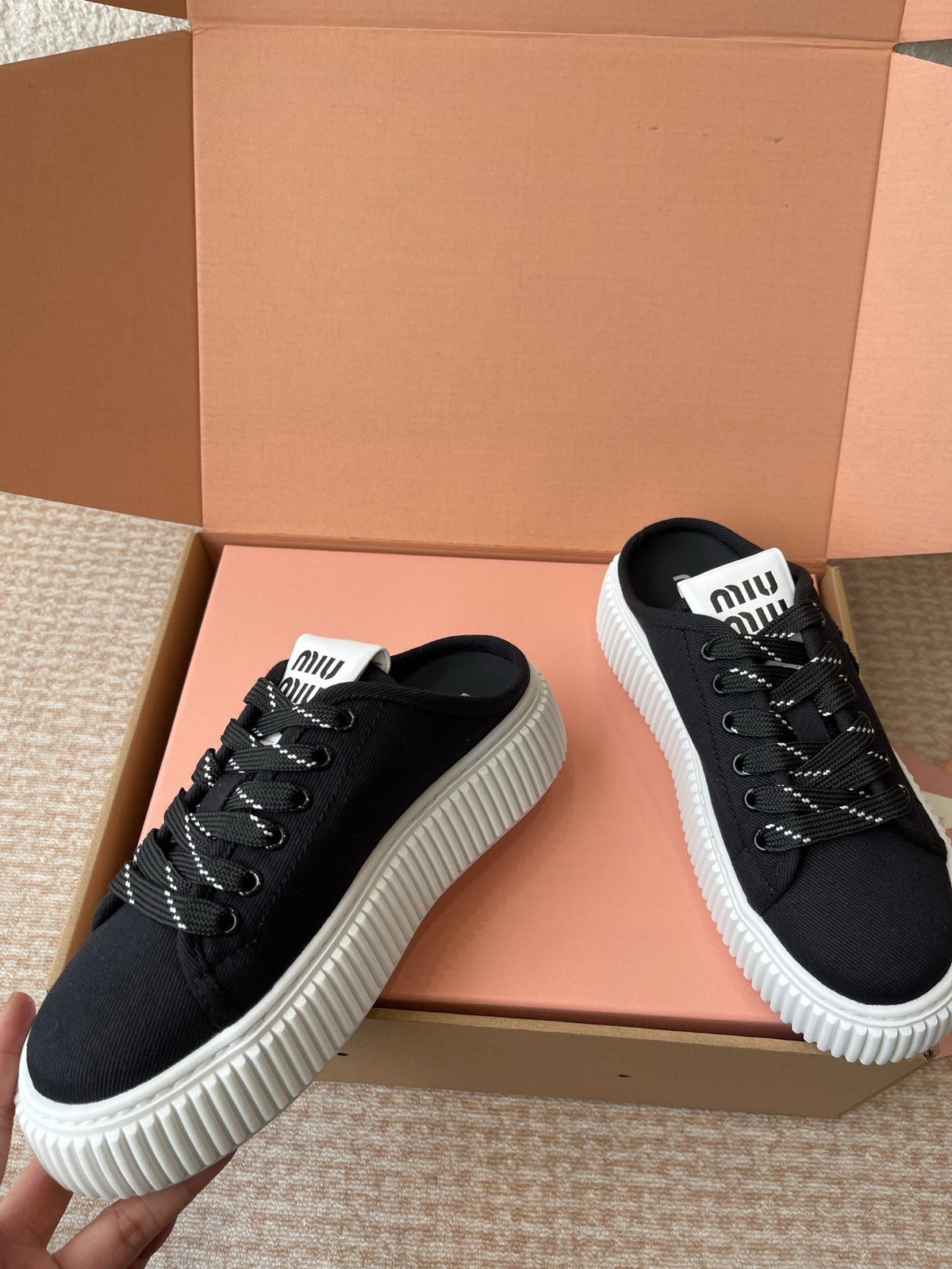 WASH SNEAKER MULES IN BLACK DENIM