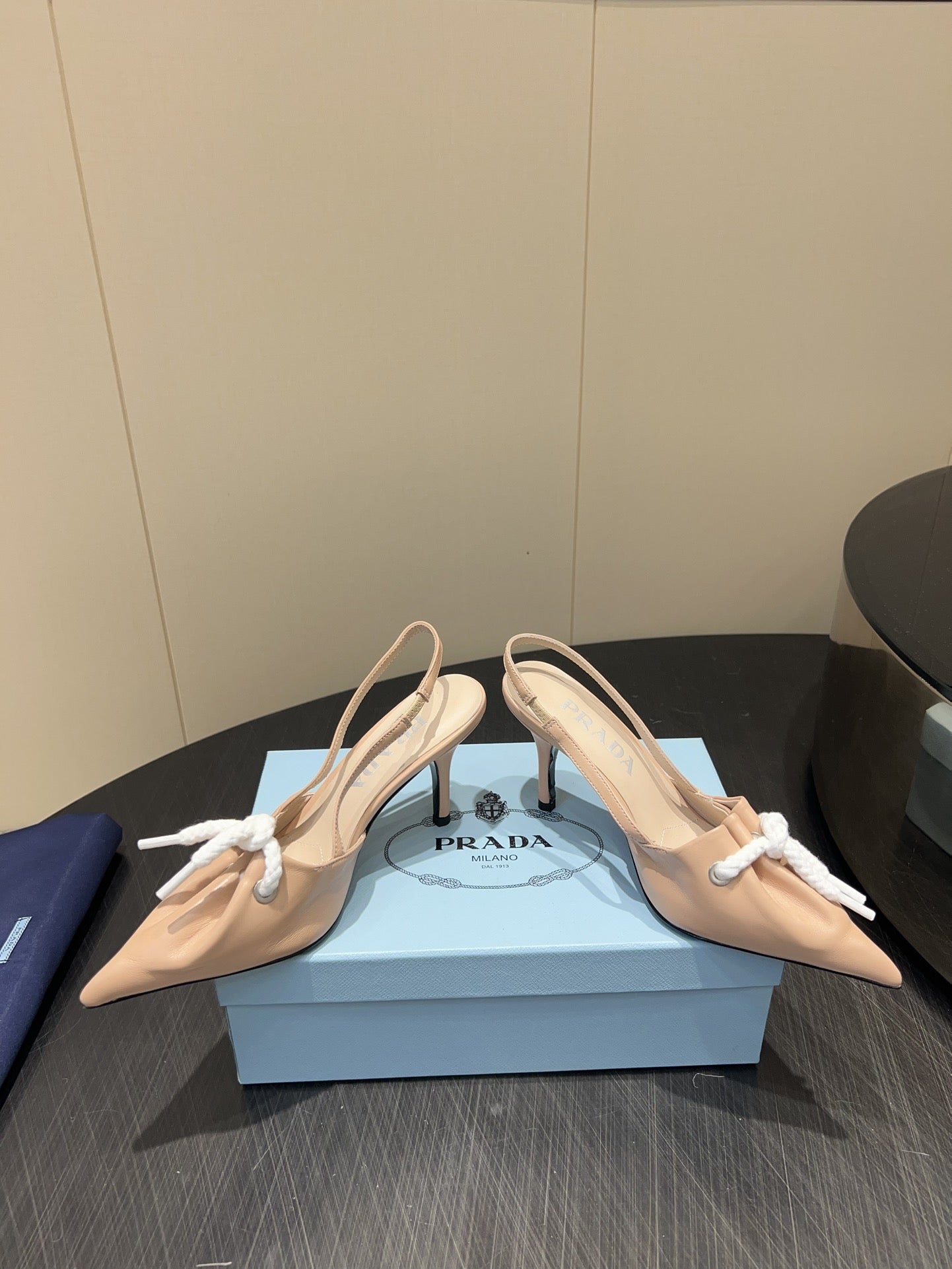 PRADA 25S POINTED TOE SLINGBACK 85MM IN BEIGE LAMBSKIN WITH TIE UP DESIGN