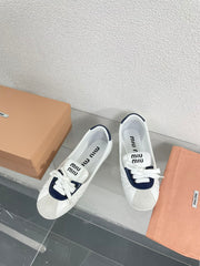 White Leather Ballet Flats With Black