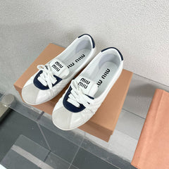 White Leather Ballet Flats With Black
