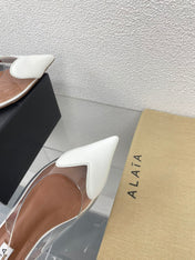 ALAIA LE COEUR FLAT SLINGBACKS IN WHITE PATENT LAMBSKIN