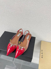 ALAIA LE COEUR FLAT SLINGBACKS IN CHERRY RED PATENT LAMBSKIN