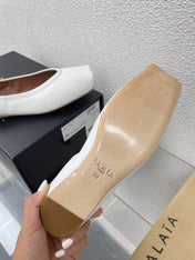 ALAIA BALLET FLATS IN WHITE CALFSKIN