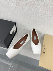 ALAIA BALLET FLATS IN WHITE CALFSKIN
