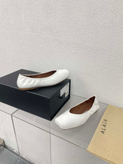 ALAIA BALLET FLATS IN WHITE CALFSKIN