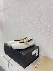 ALAIA MARY JANE PEARL IN GLOSSY WHITE LAMBSKIN