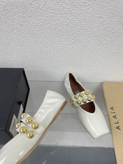ALAIA MARY JANE PEARL IN GLOSSY WHITE LAMBSKIN