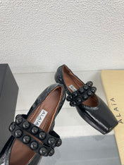 ALAIA MARY JANE PEARL IN GLOSSY BLACK LAMBSKIN