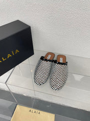 ALAIA FLAT MULES IN STRASS BLACK LAMBSKIN WITH RHINSTONES
