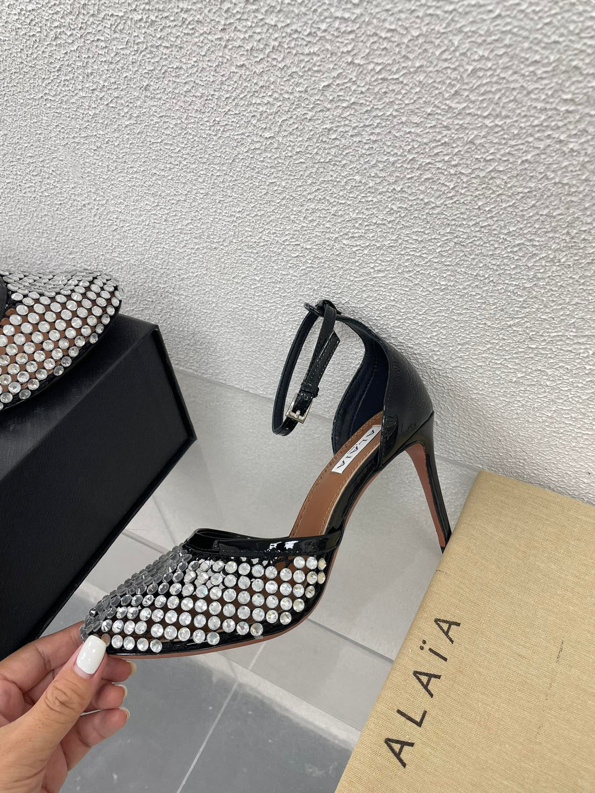 ALAIA HIGH FISHNET PUMPS IN BLACK MESH WITH WHITE RHINSTONES