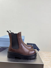 PRADA 25S PLATFORM CHELSEA BOOTS IN DARK BROWN CALFSKIN