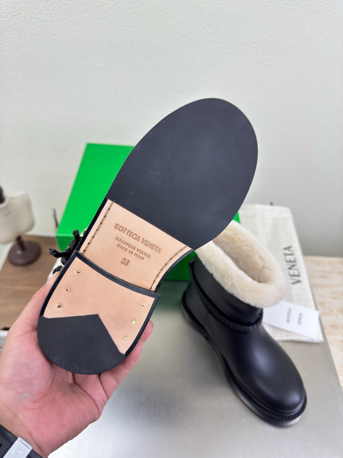 BOTTEGA VENETA 26S FUR-LINED BOOTS IN BLACK CALFSKIN AND WHITE WOOL