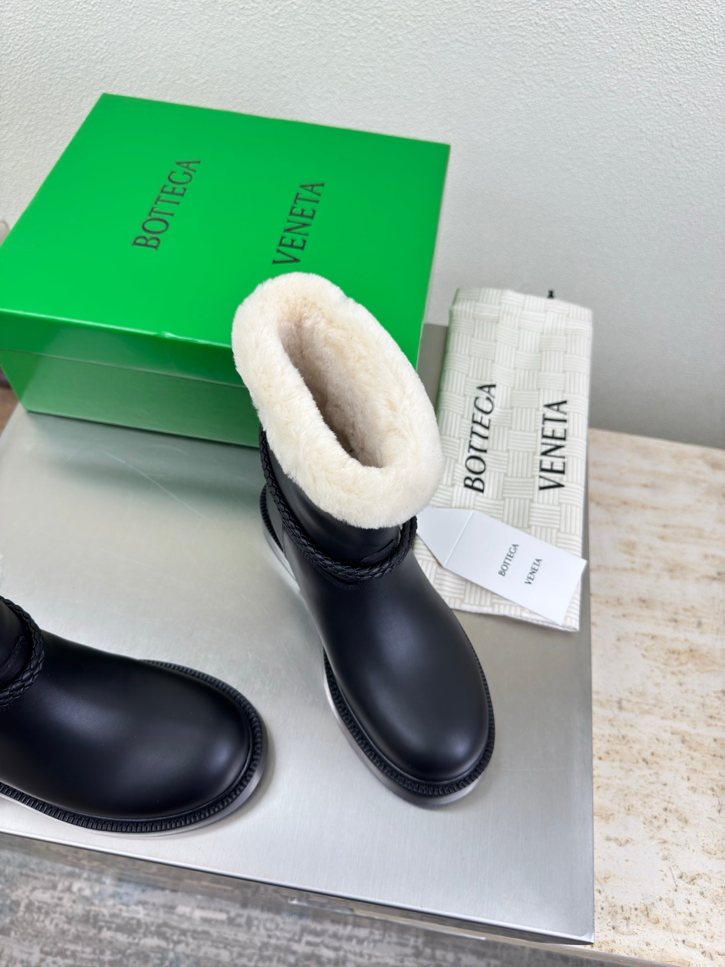 BOTTEGA VENETA 26S FUR-LINED BOOTS IN BLACK CALFSKIN AND WHITE WOOL