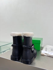 BOTTEGA VENETA 26S FUR-LINED BOOTS IN BLACK CALFSKIN AND WHITE WOOL