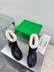 BOTTEGA VENETA 26S FUR-LINED BOOTS IN BLACK CALFSKIN AND WHITE WOOL