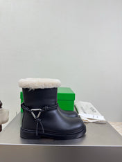 BOTTEGA VENETA 26S FUR-LINED BOOTS IN BLACK CALFSKIN AND WHITE WOOL