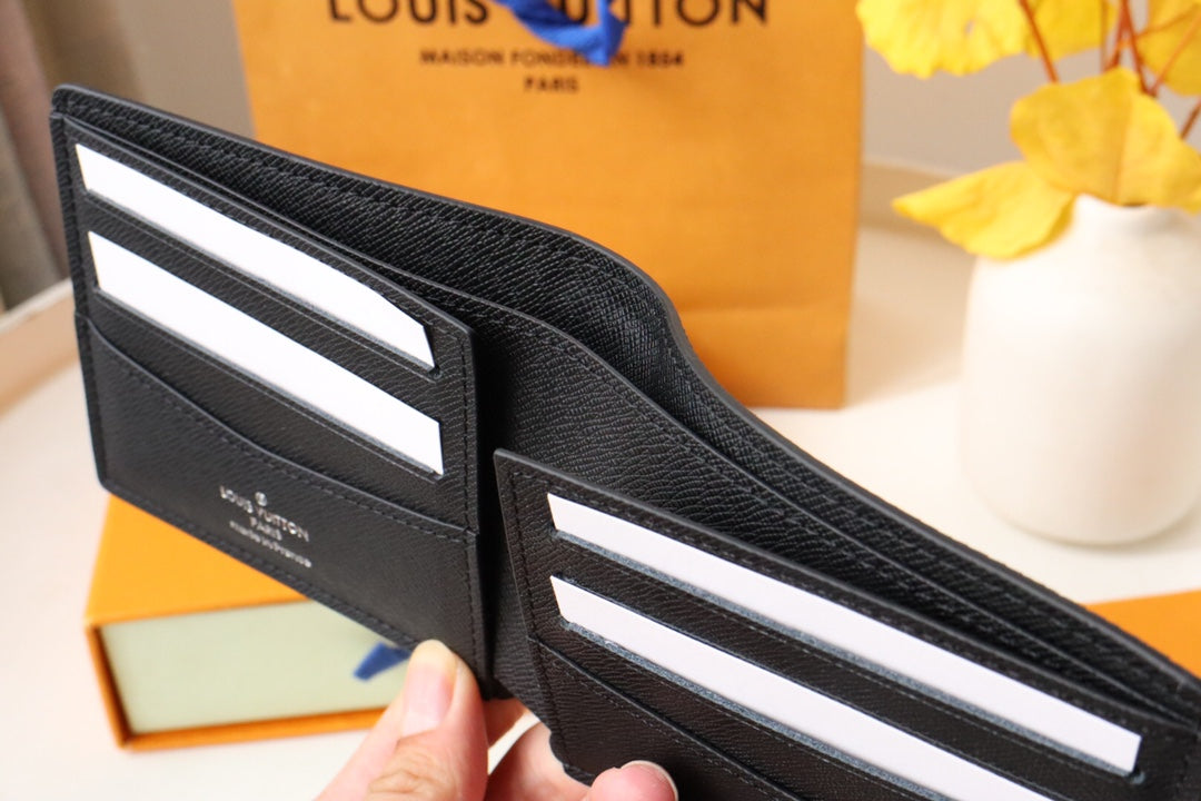 LV 25S SLENDER WALLET 11 IN BLACK TAIGA CALFSKIN