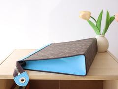 LV 25S POCHETTE VOYAGE 26 IN GASTON BLUE MONOGRAM MACASSAR COATED CANVAS